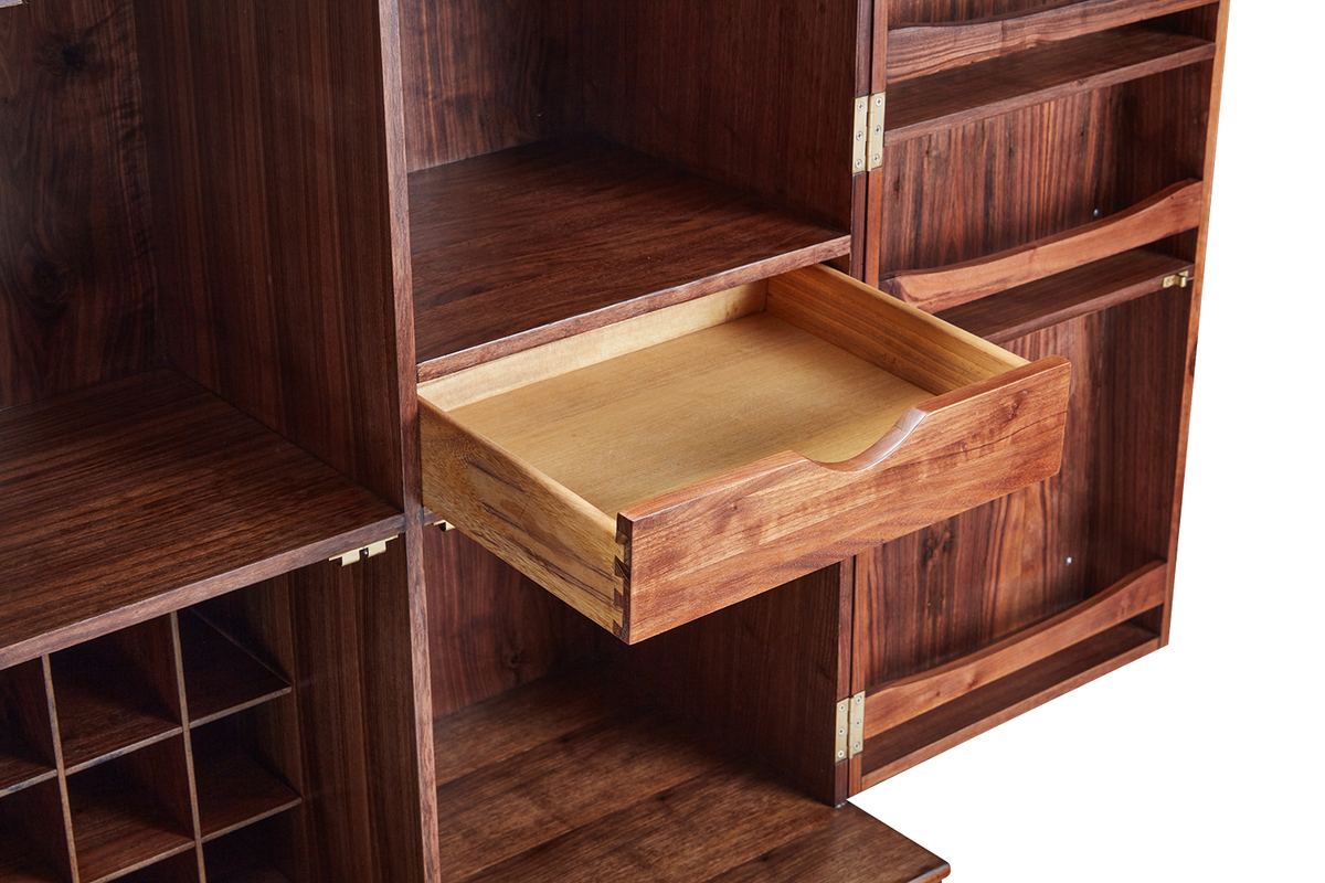 Dovetailed drawer fits all your bar tools, napkins, coasters, etc.